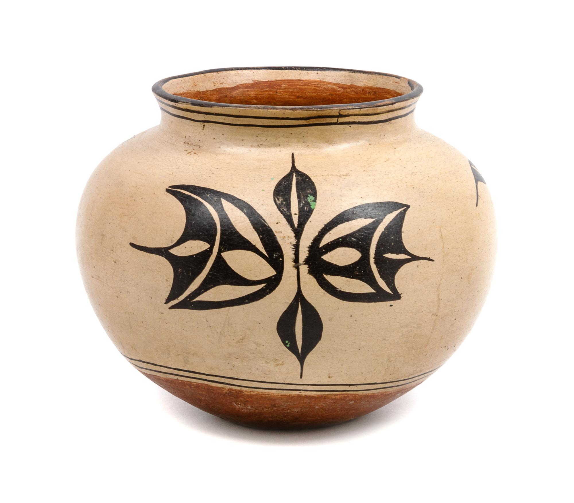An Acoma Pottery Vase Height 9 x diameter 11 inches.