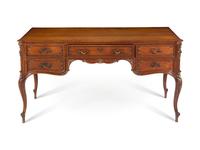 A Louis XV Style Parcel Gilt Oak Bureau Plat