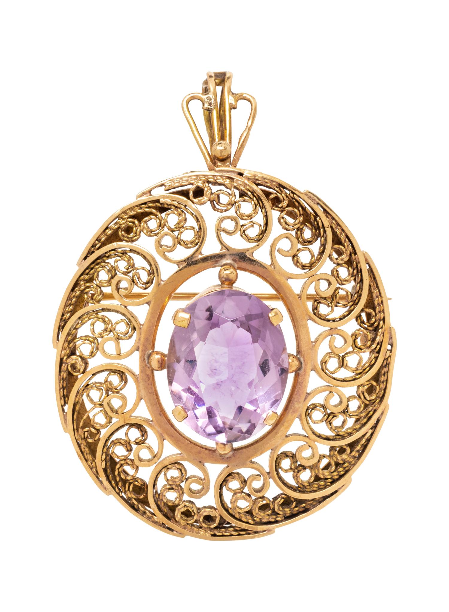 A 14 Karat Yellow Gold and Amethyst Pendant/Brooch,