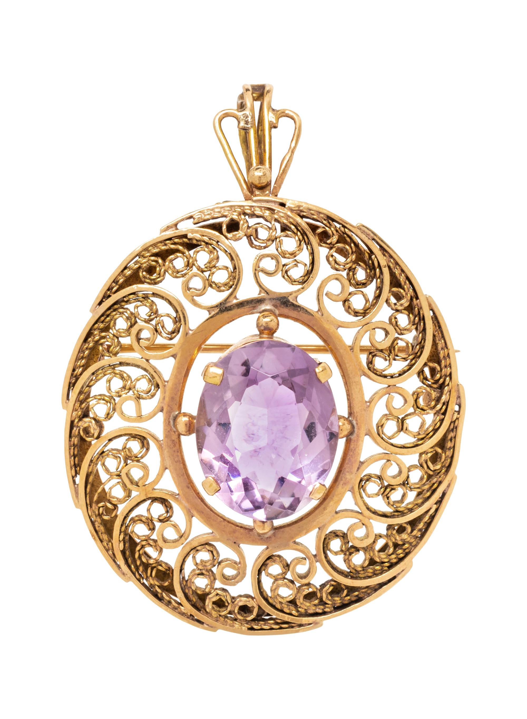 A 14 Karat Yellow Gold and Amethyst Pendant/Brooch,