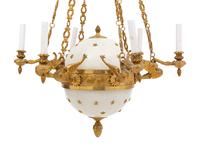 An Empire Style Gilt Bronze and Tole Six-Light Chandelier