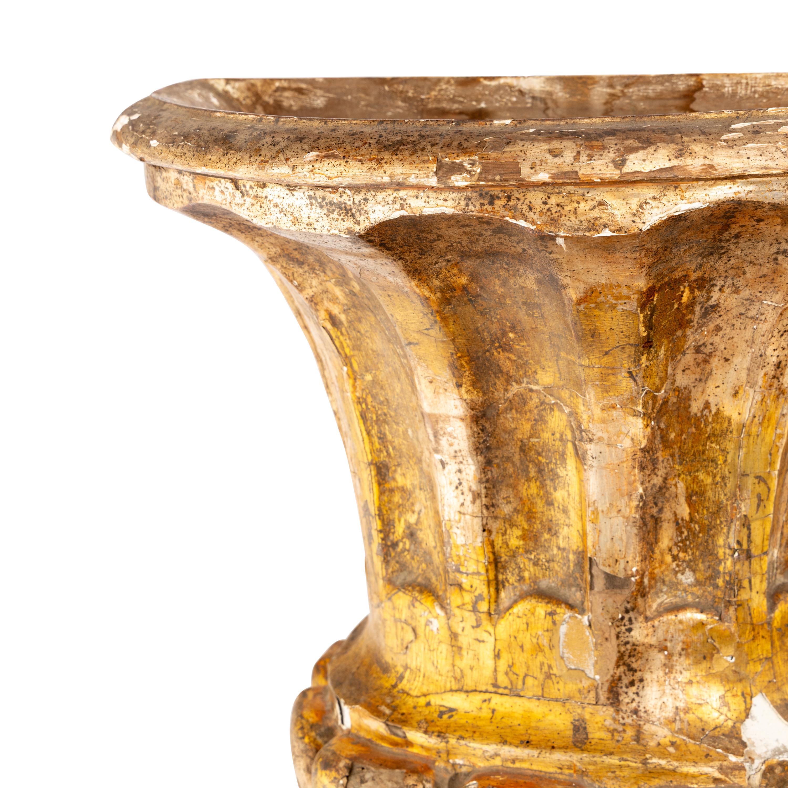 A Pair of Italian Giltwood Flat-Back Urns