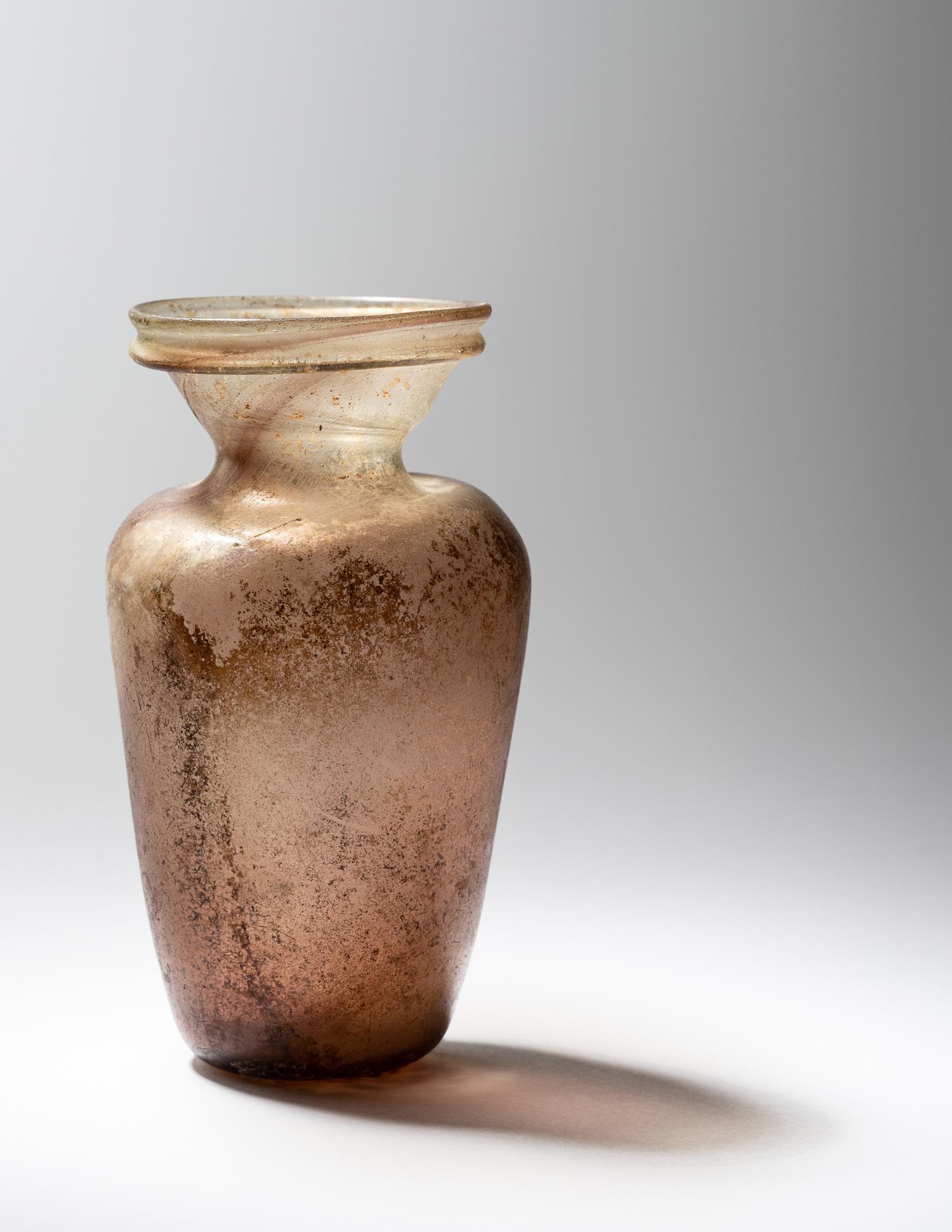 A Roman Aubergine Glass Vessel