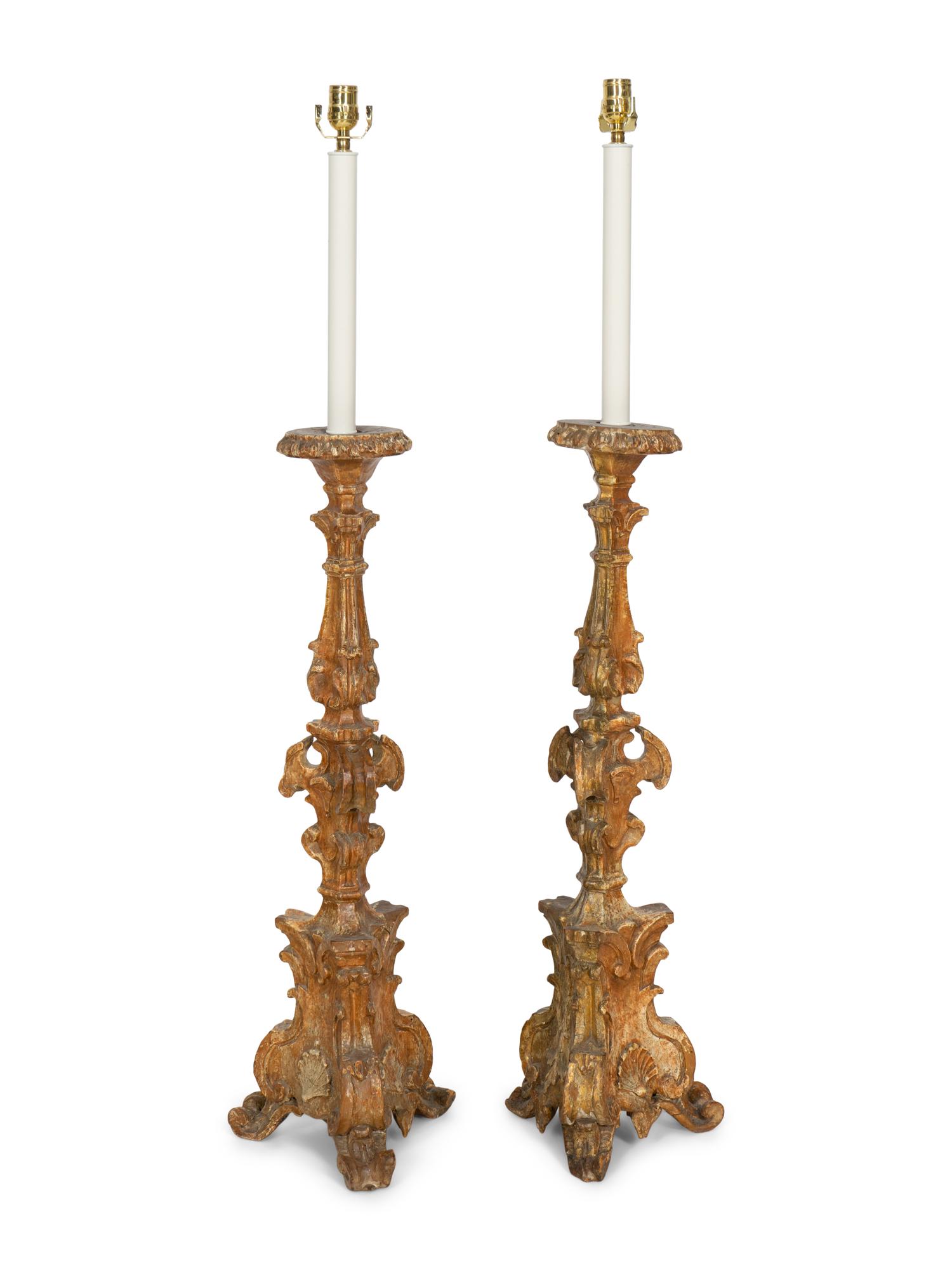 A Pair of Italian Baroque Giltwood Prickets