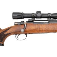 ** Sporterized Mauser 98 with Sleeved Barrel and Weaver Scope