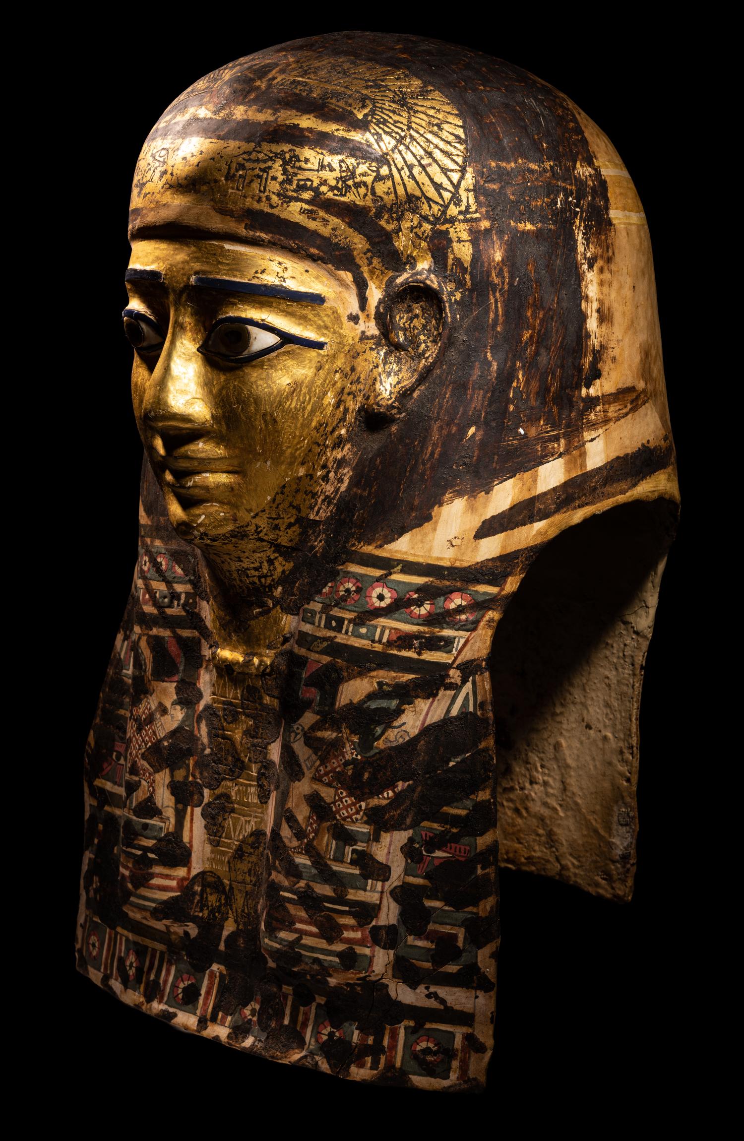 An Egyptian Gilt Cartonnage Mummy Mask