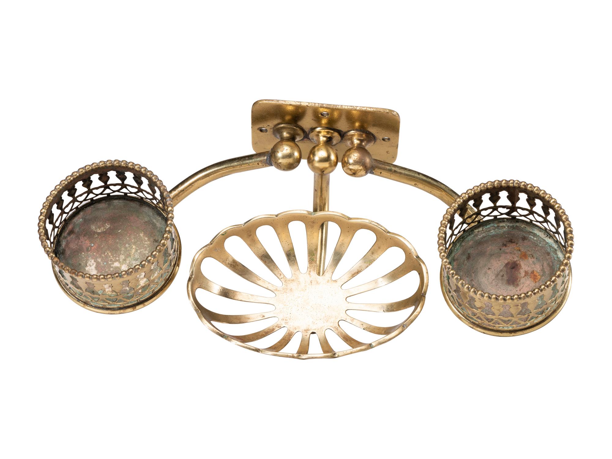 A Pierced Brass Wall Sconce
