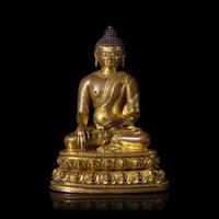 A Tibetan Gilt Copper Alloy Figure of Seated Akshobya, 15th Century 十五世紀 藏傳銅合金阿閦佛