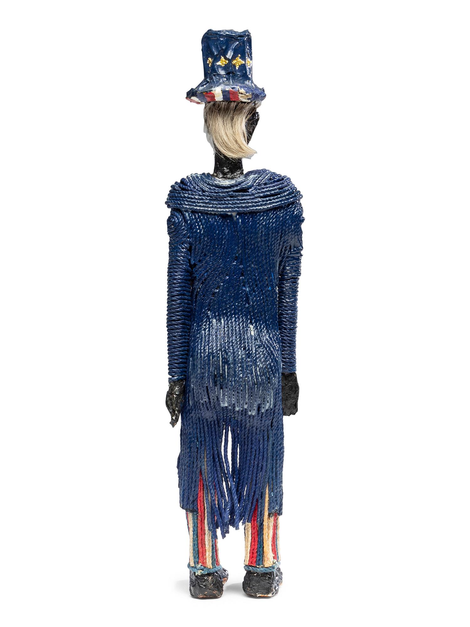 A Folk Art Painted String, Papier Mache and Hair Uncle Sam Figure