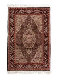 A Tabriz Wool Rug