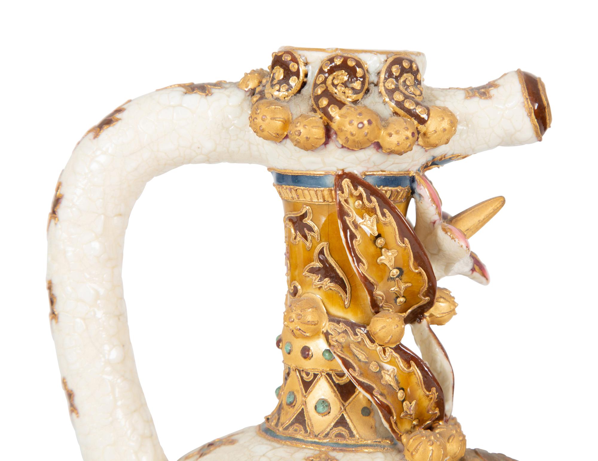 A Continental Polychrome and Gilt-Encrusted Porcelain Ewer — 19TH CENTURY