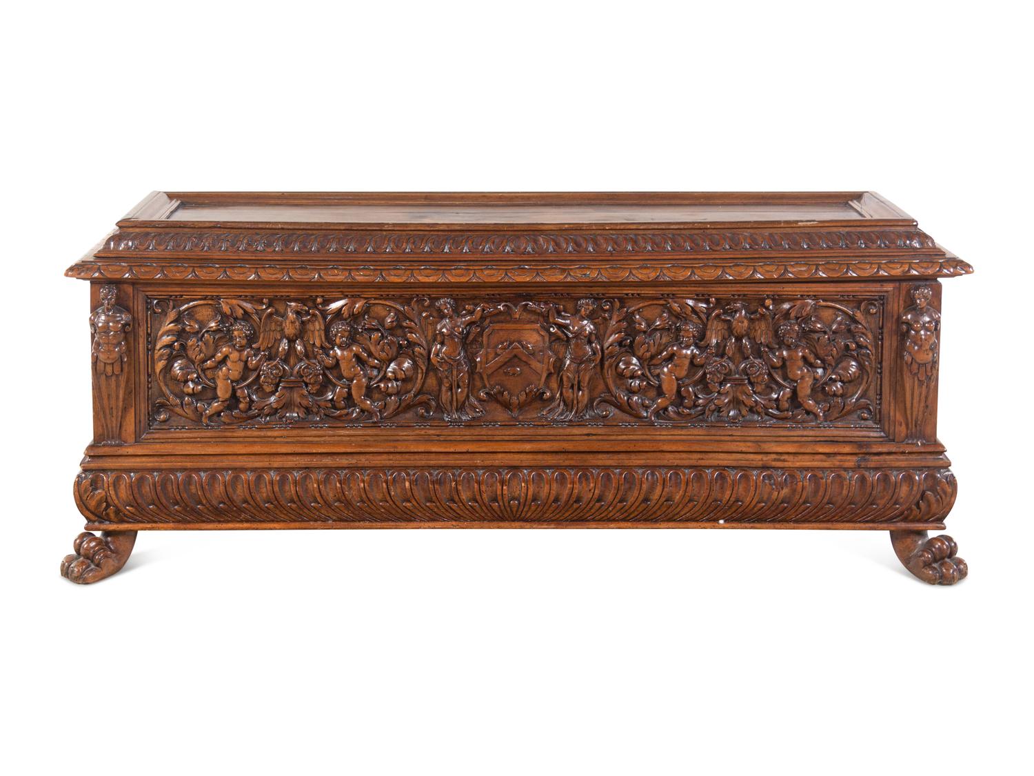 An Italian Carved Walnut Cassone
