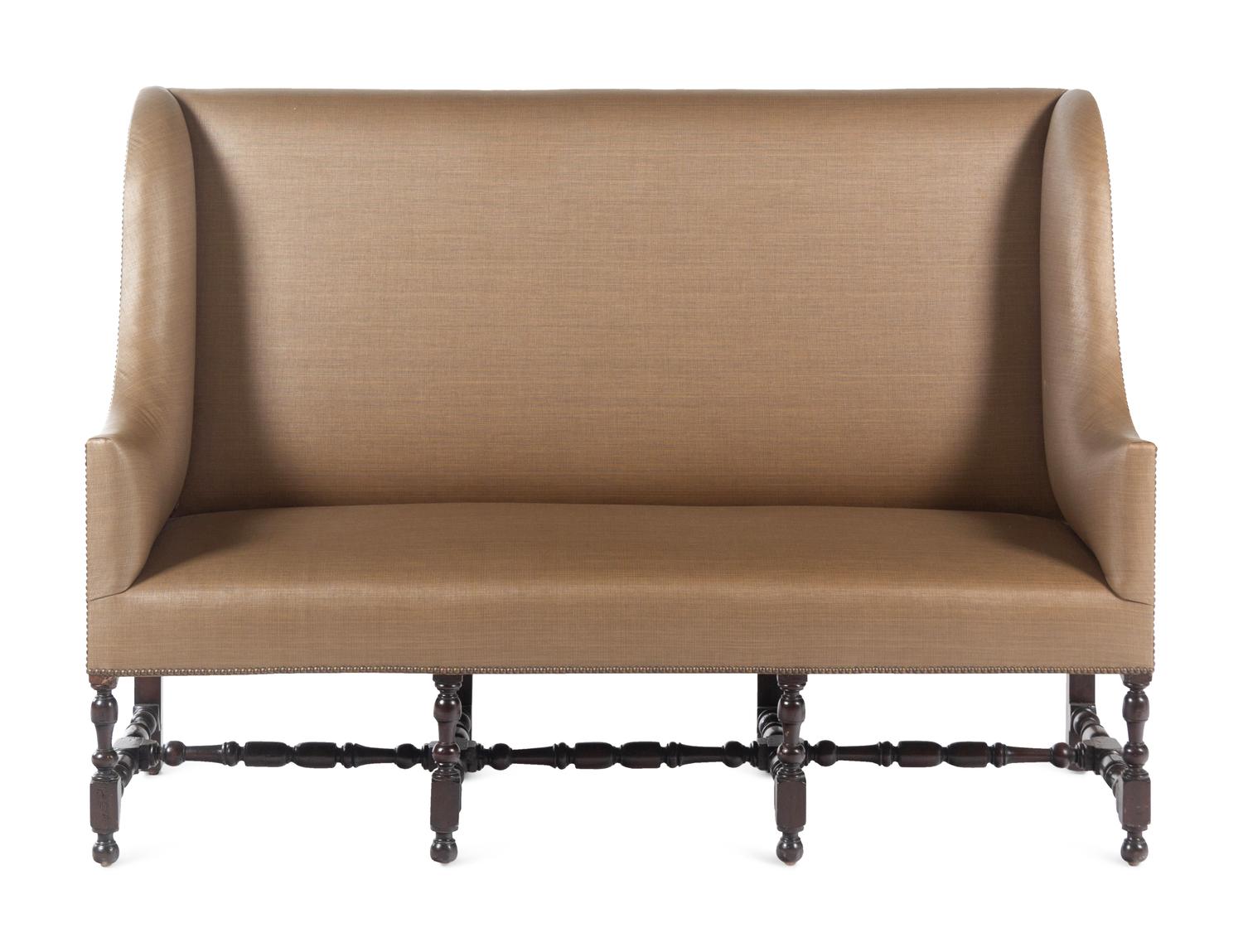 A French Walnut Wingback Sofa