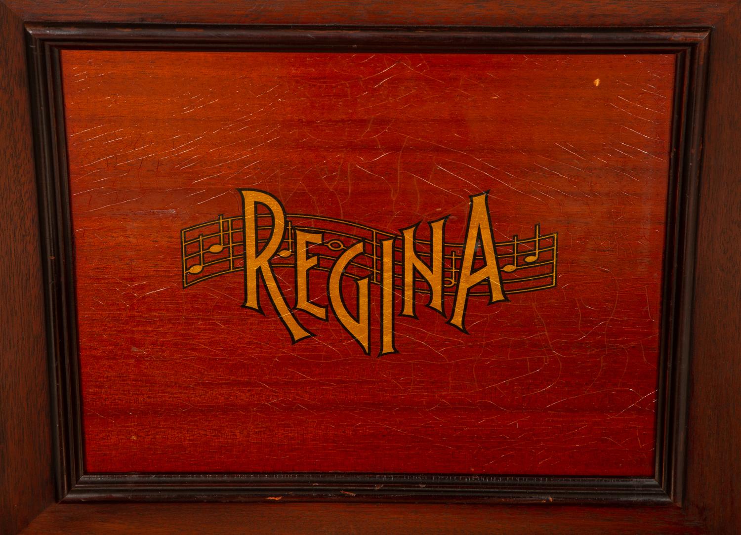 A Regina Mahogany Serpentine Cabinet Music Box
