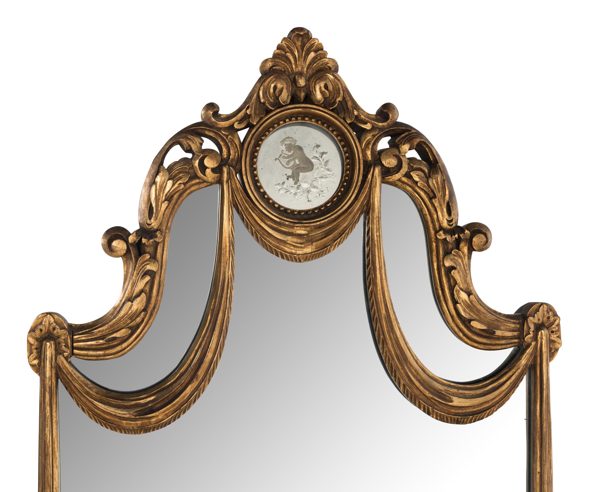 A Venetian Style Giltwood Mirror