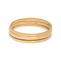 COLLECTION OF YELLOW GOLD BANGLE BRACELETS