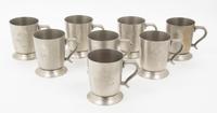 Eight American Pewter Mugs, Ozelines Height 4 1/8 inches. — 20TH CENTURY