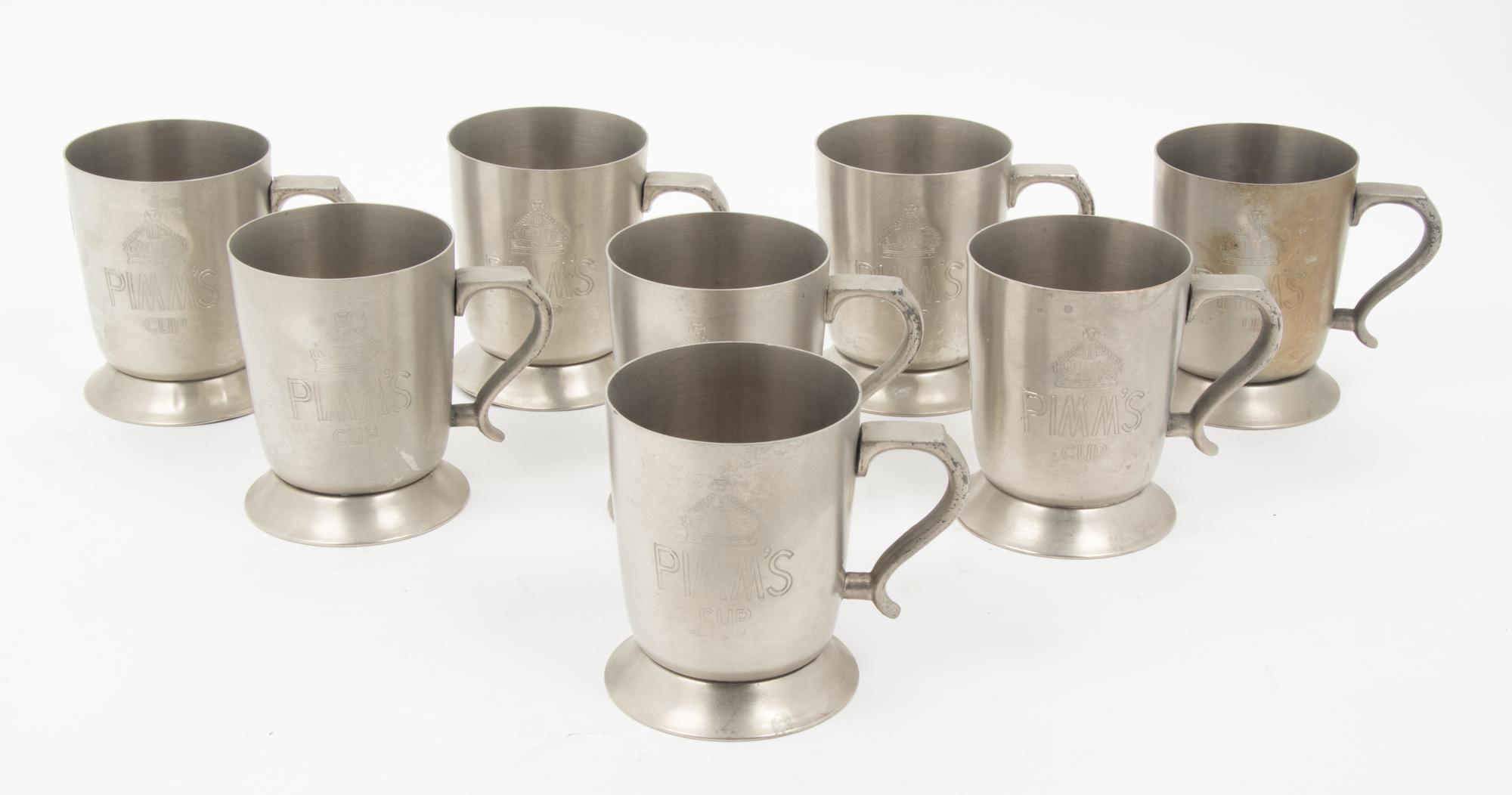 Eight American Pewter Mugs, Ozelines Height 4 1/8 inches. — 20TH CENTURY