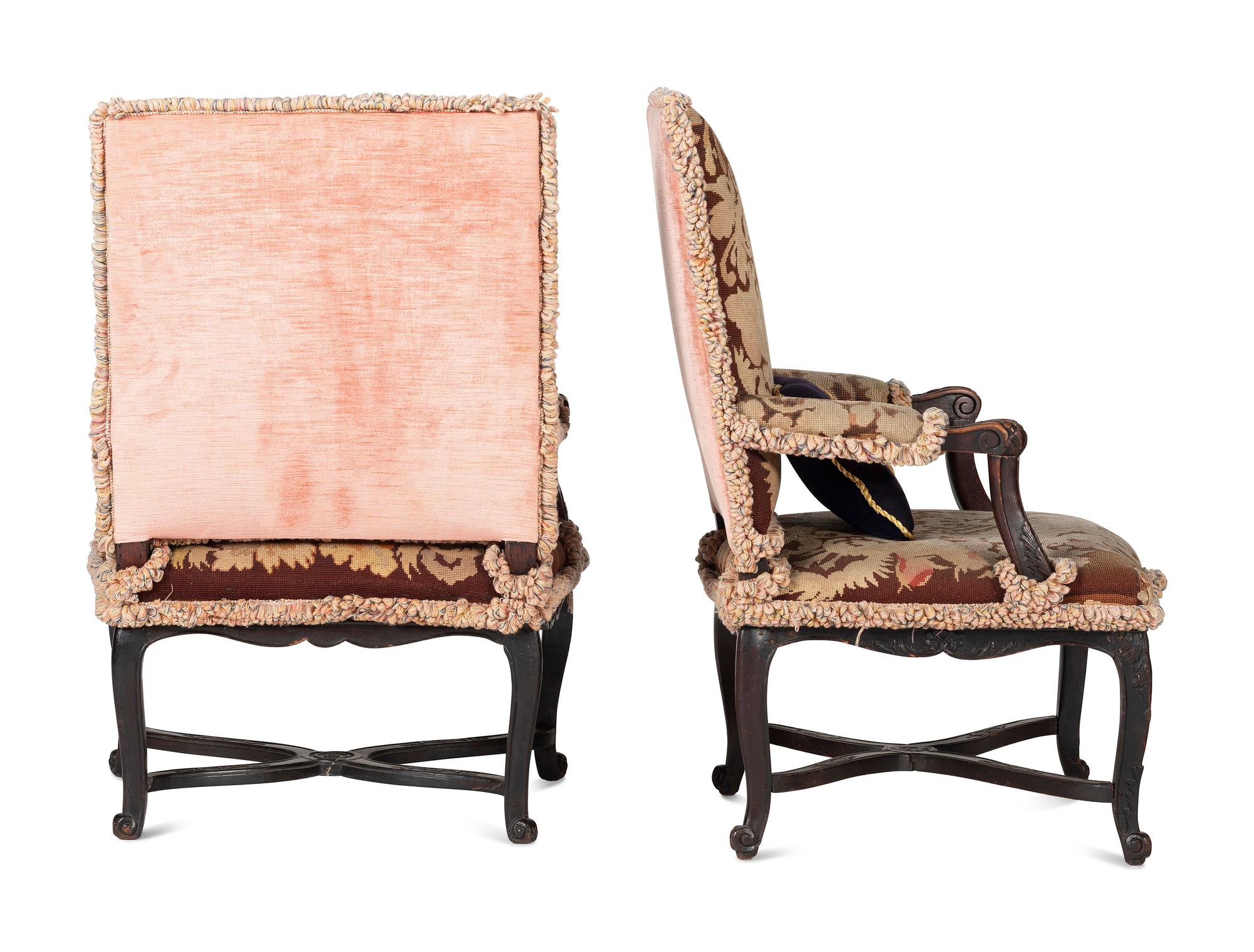 A Pair of Louis XV Style Carved Walnut Needlepoint Upholstered Fauteuils