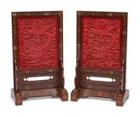 A Pair of Chinese Carved Red Lacquer Table Screens in Polychrome Lacquer Stands
