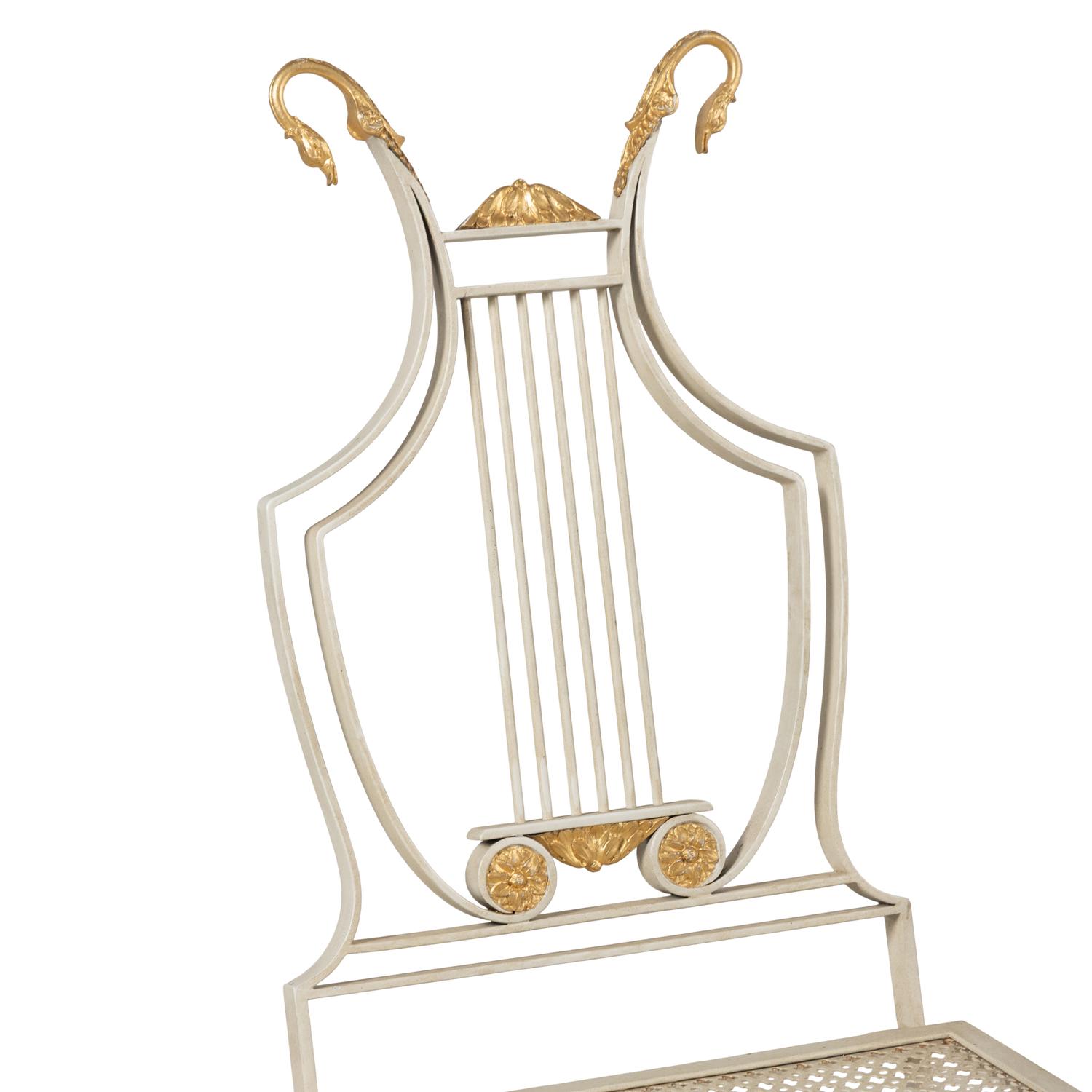 A Set of Six Neoclassical Style Cream-Painted and Parcel Gilt Garden Chairs