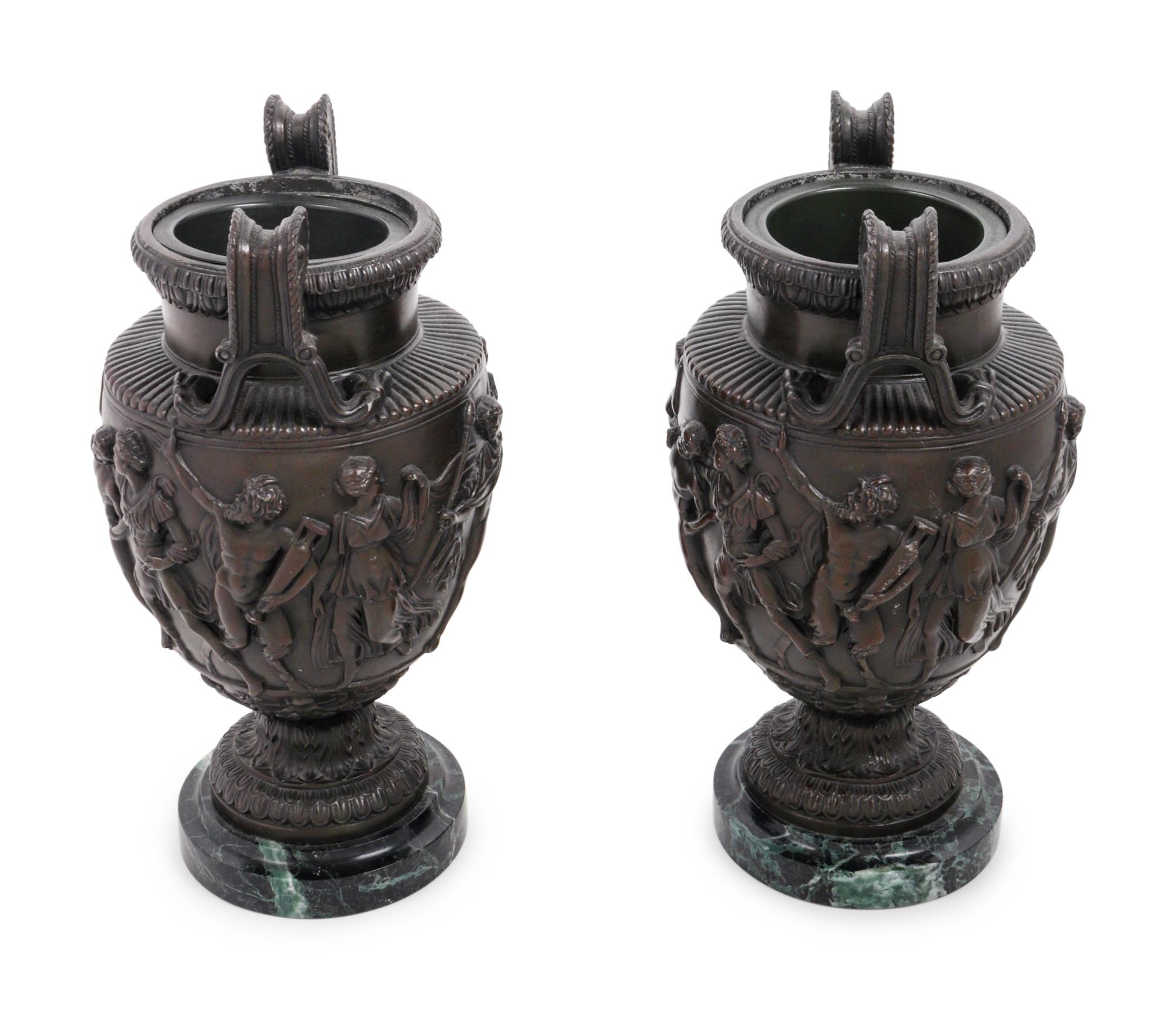 A Pair of Grand Tour Cast Metal and Marble Urns