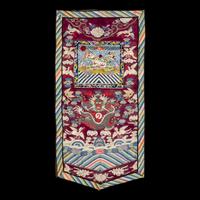 A Chinese Maroon Ground Embroidered and Kesi Silk 'Xiezhi' Rank Badge, Late 19th Century 清晚期 絳紅地緙絲納紗御史獬豸補子