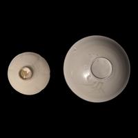 A Chinese Whiteware Foliate Bowl and a Dingyao Style Incised Bowl 白釉碗兩件