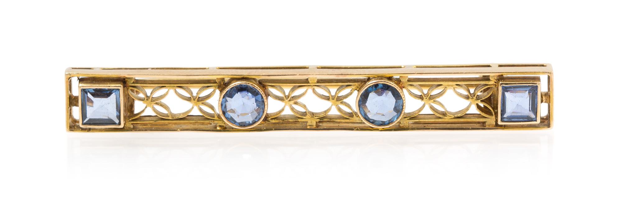 A Yellow Gold and Sapphire Bar Brooch, 2.70 dwts.