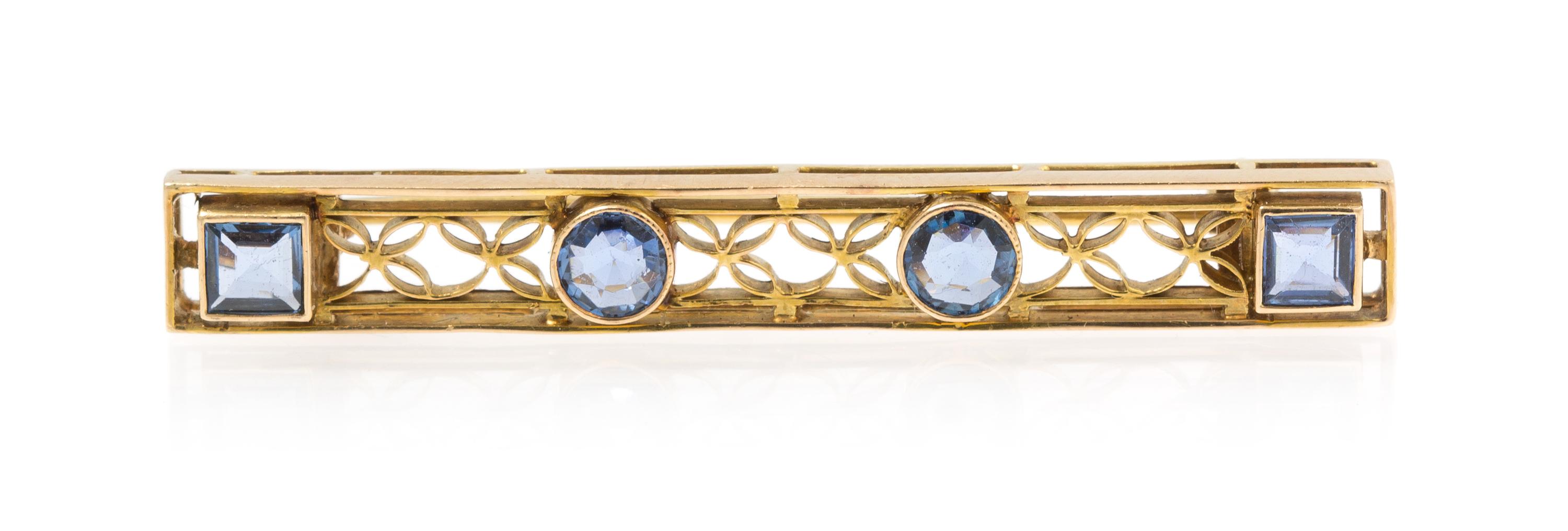 A Yellow Gold and Sapphire Bar Brooch, 2.70 dwts.