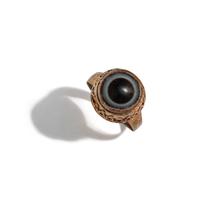 A Near Eastern Banded Agate Cabochon — Set in a gold ring