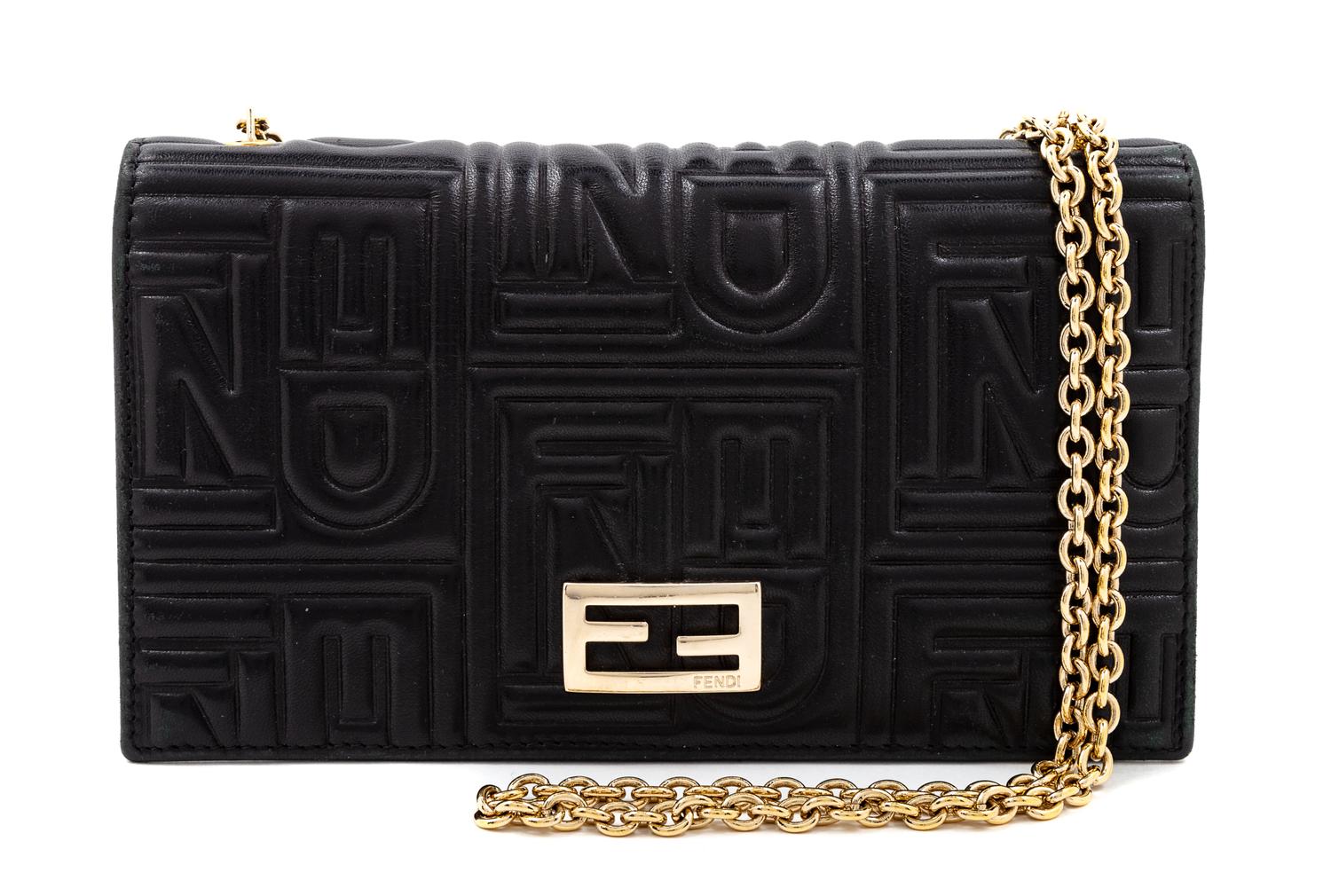 A Fendi Black Monogram Embossed Leather Wallet/Shoulder Bag, 7.5" L x .75" W x 4" H; Chain strap drop: 19".
