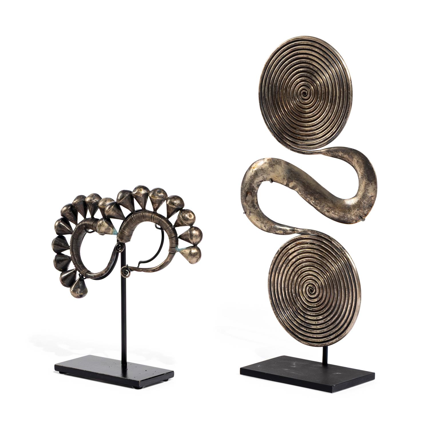 Two Metal Ornaments on Stands