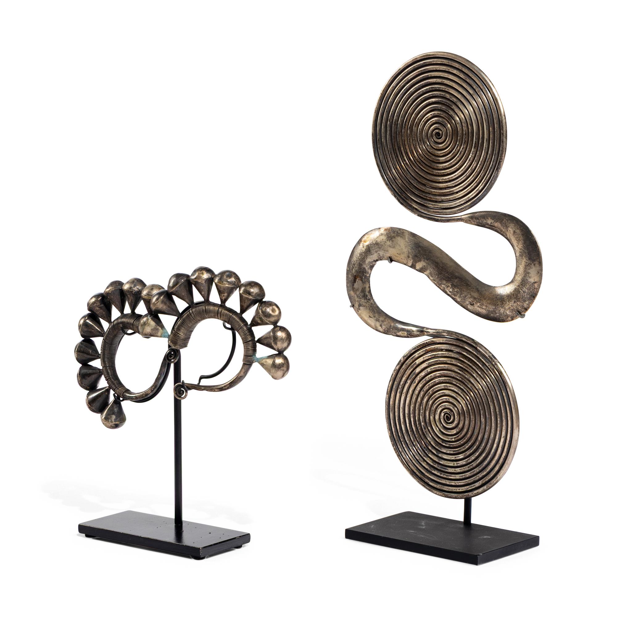 Two Metal Ornaments on Stands