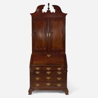 A Chippendale carved mahogany secretary desk and bookcase Possibly Pennsylvania, 18th century with later additions