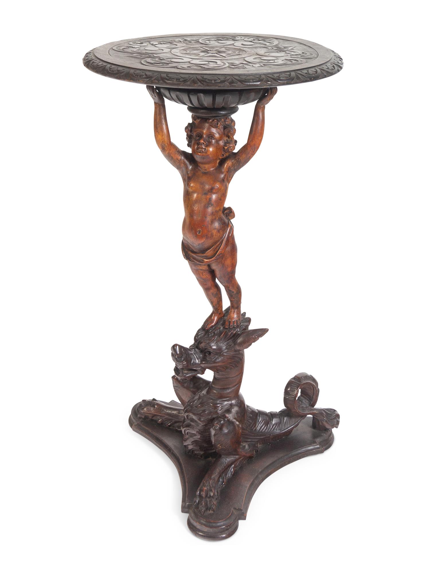 A Venetian Carved Walnut Figural Table