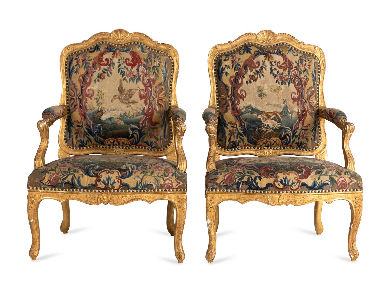 A Pair of Régence Tapestry-Upholstered Giltwood Fauteuils