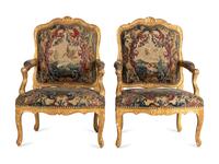 A Pair of Régence Tapestry-Upholstered Giltwood Fauteuils