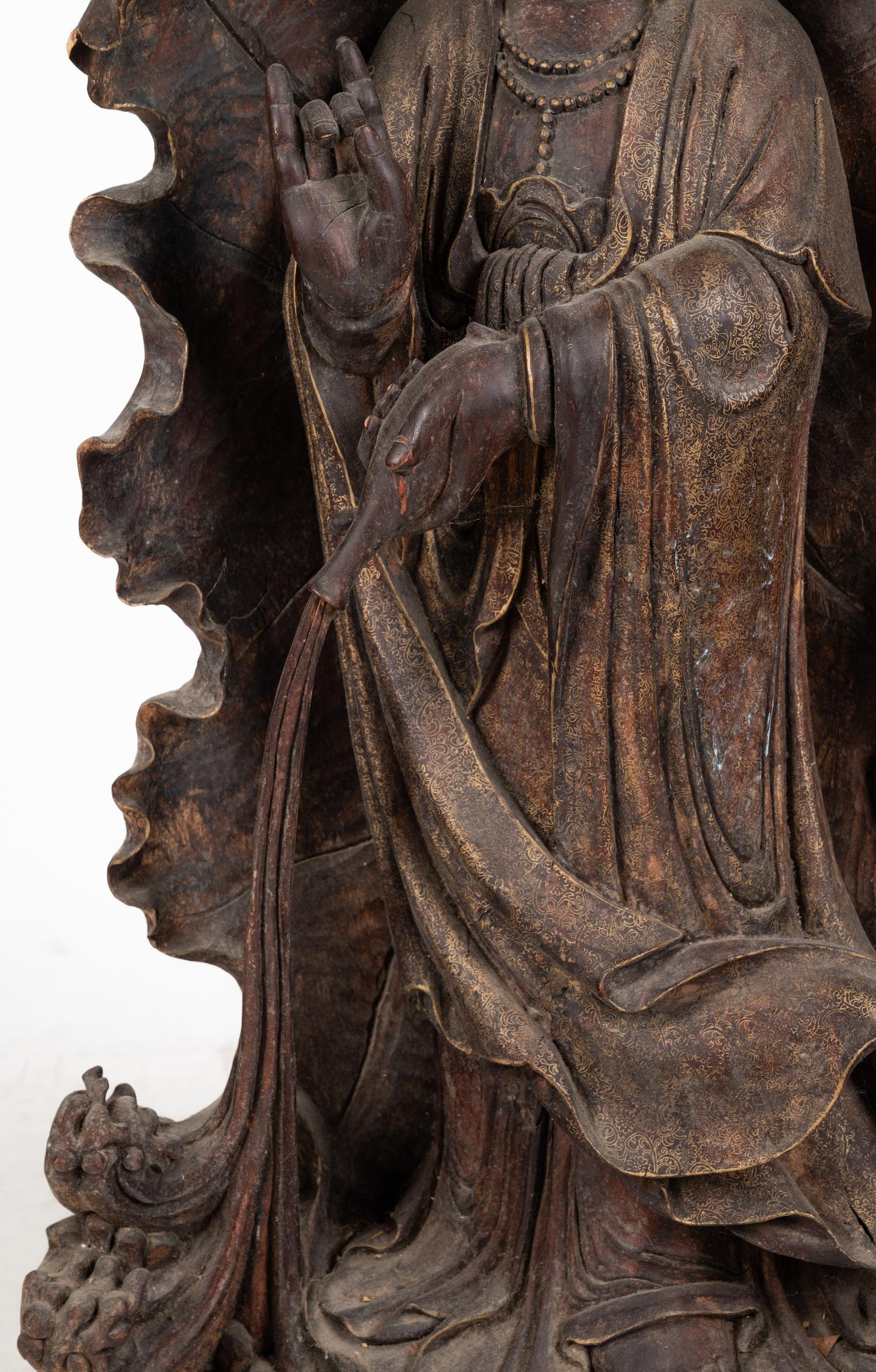 A Monumental Chinese Parcel Gilt Carved Harwood Figure of Guanyin