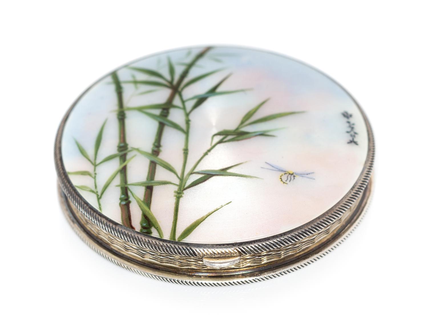 A Continental Silver and Enamel Compact, Import Mark GS, London, 1925, the lid enameled with bamboo shoots, dragonflies and four Chines