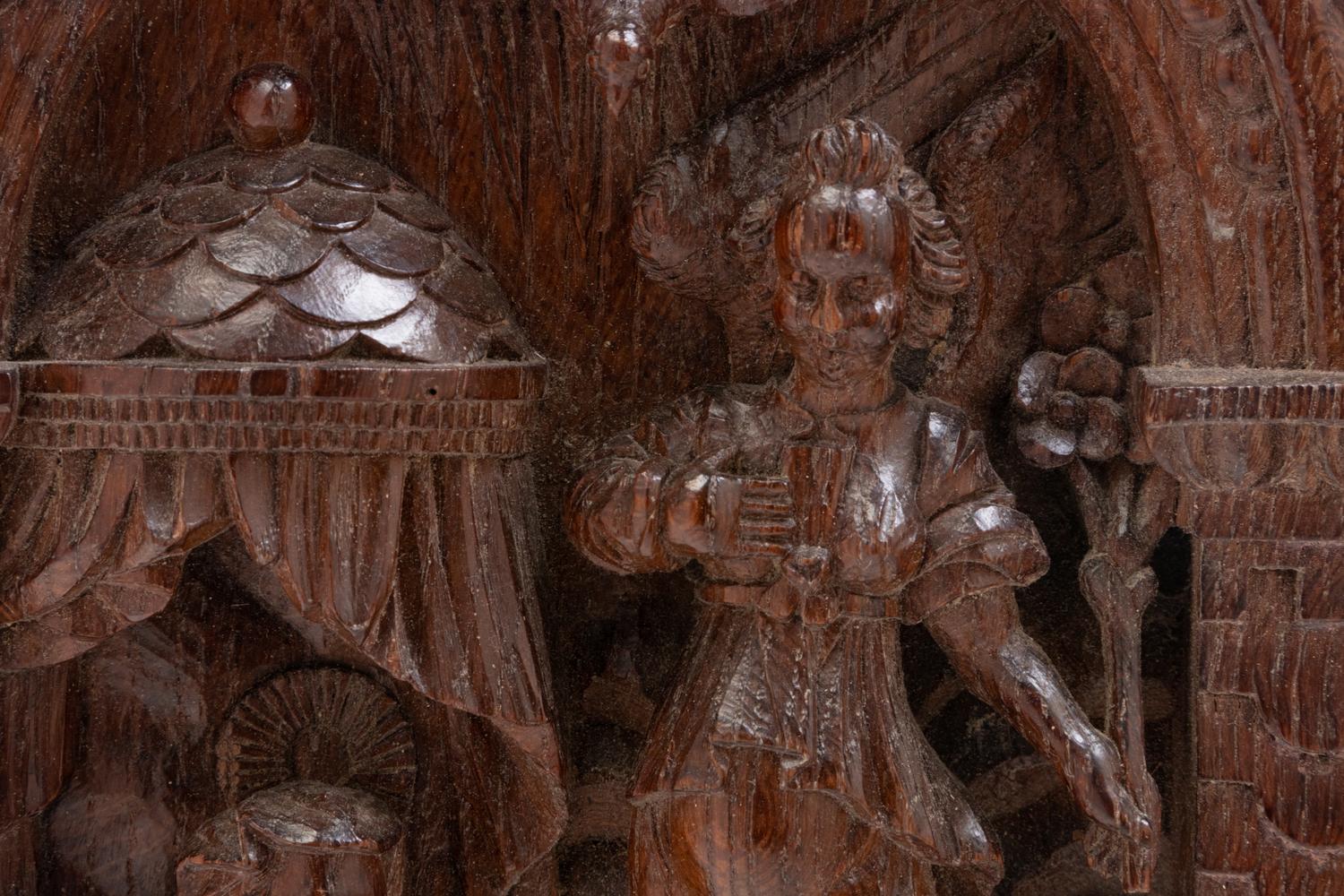 Two Continental Carved Panels Depicting the Holy Family and a Confession