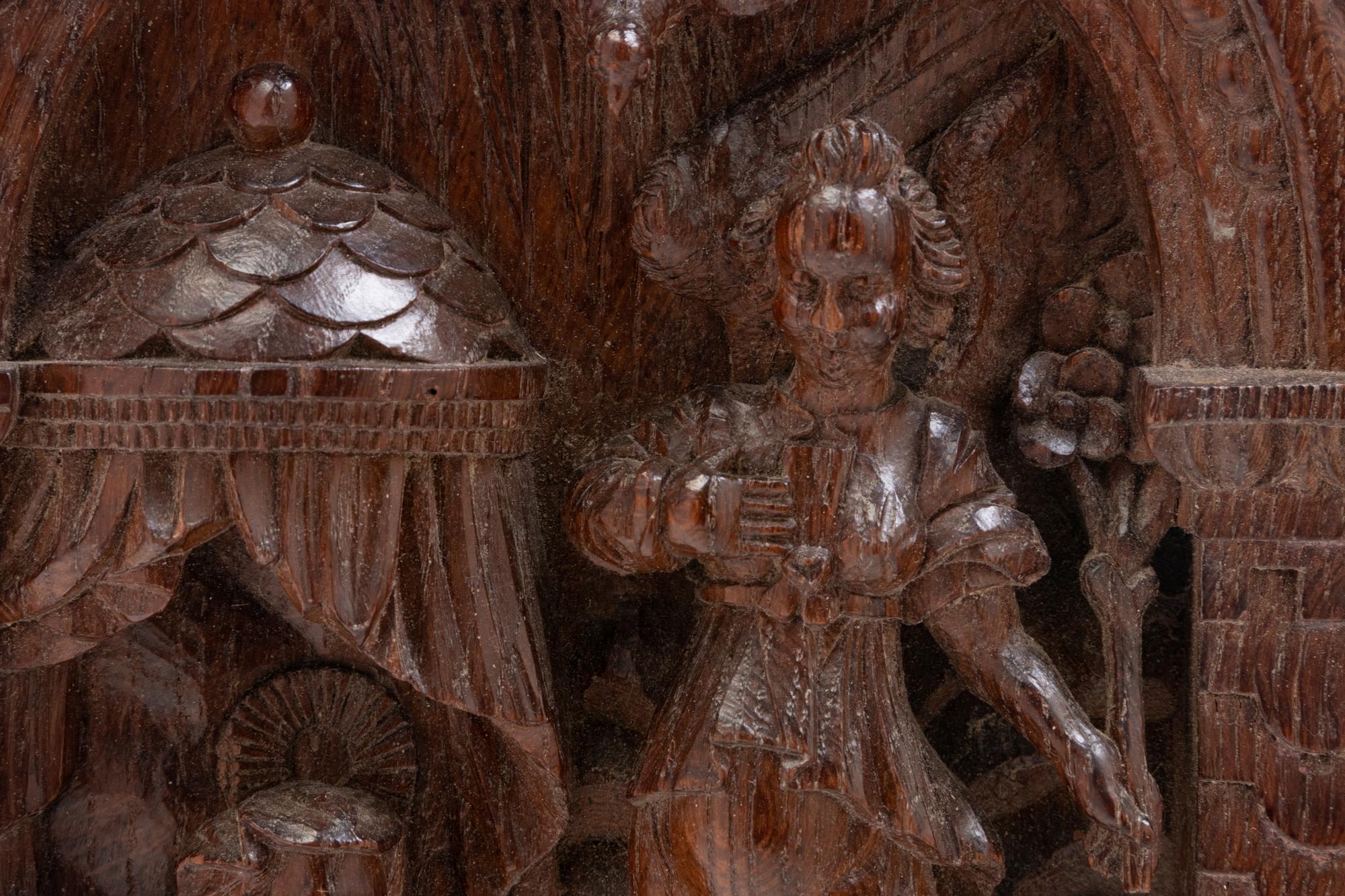 Two Continental Carved Panels Depicting the Holy Family and a Confession