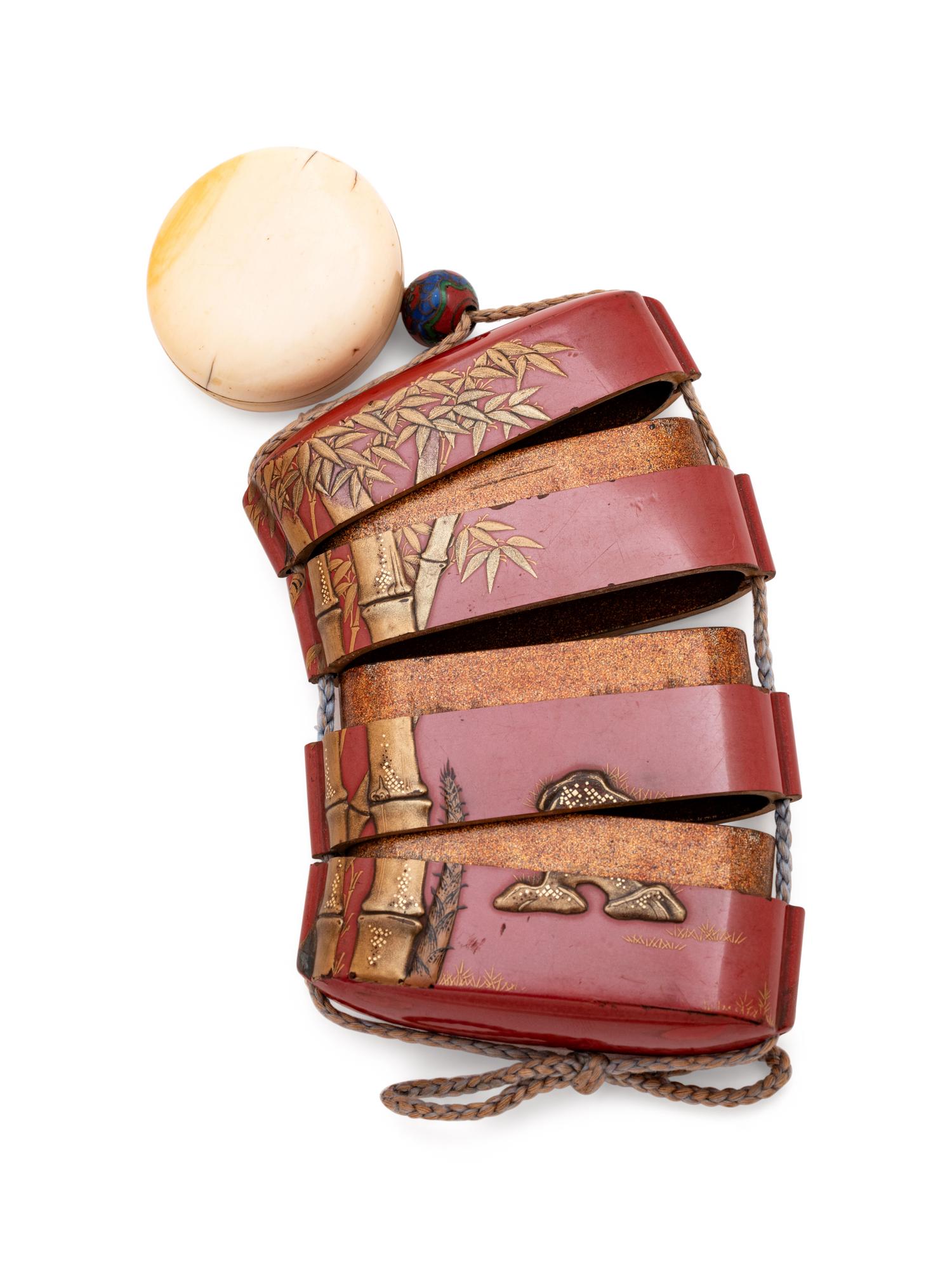 A Gilt and Red Lacquer Three-Case Inro