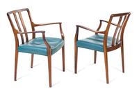 A Set of Twelve Danish Rosewood Dining Chairs — 1960s