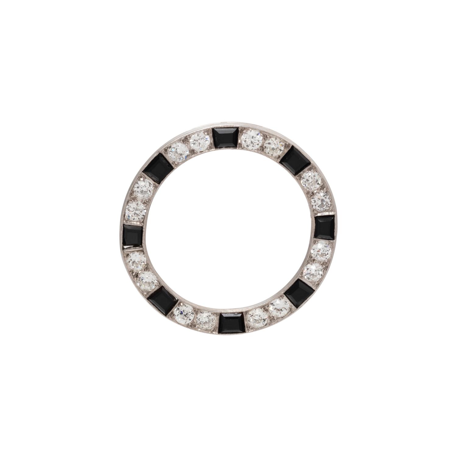 DIAMOND AND ONYX CIRCLE BROOCH