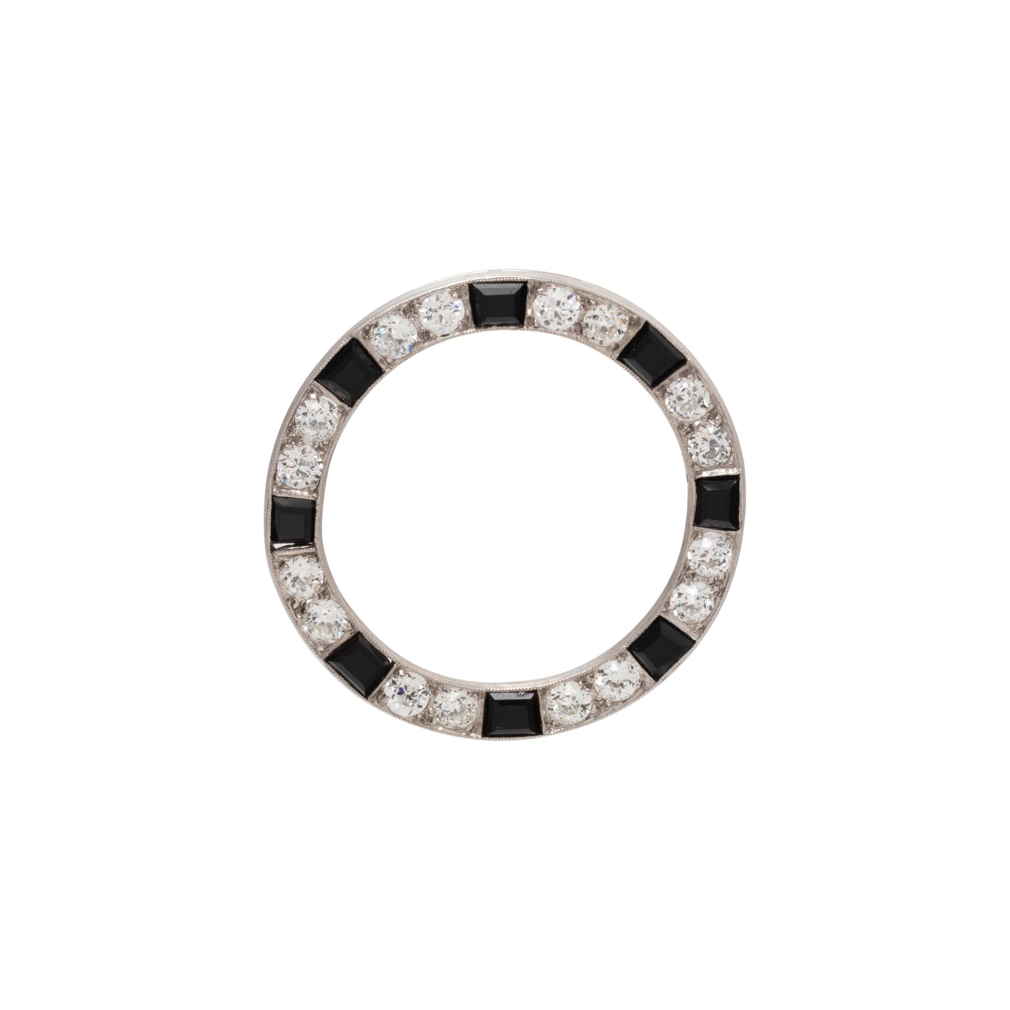 DIAMOND AND ONYX CIRCLE BROOCH