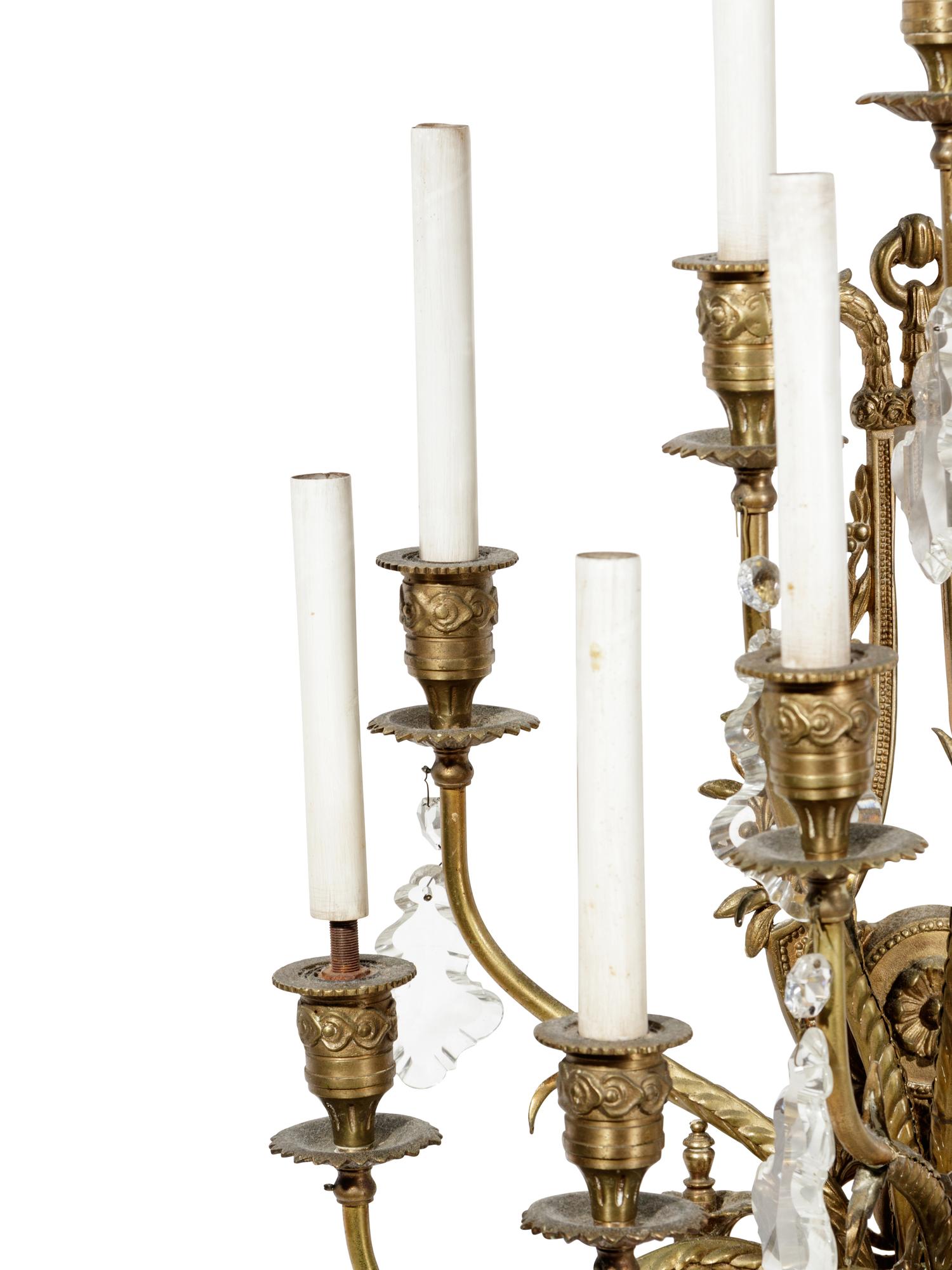A Set of Four Gilt Bronze and Baccarat Glass Sconces