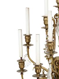 A Set of Four Gilt Bronze and Baccarat Glass Sconces
