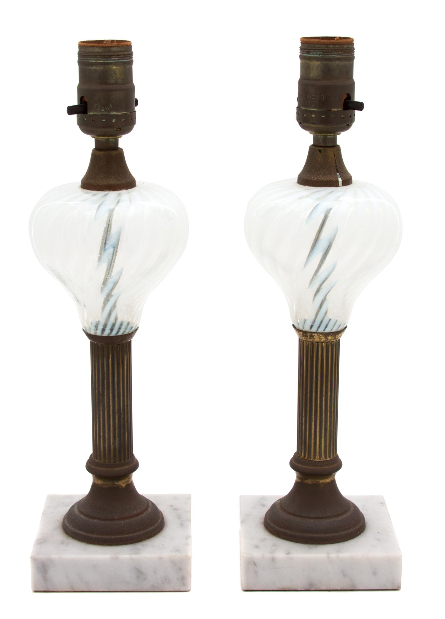 A Pair of American Swirled Glass and Brass Oil Lamps Height 13 inches. — 19TH CENTURY