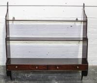 An English Mahogany Hanging Étagère Width 36 inches. — 20TH CENTURY